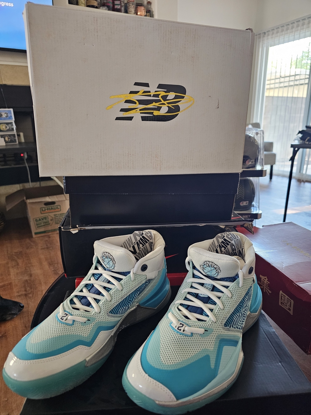 New Balance KAWHI "Christmas/Snowman" basketball shoes in a frosty light blue.